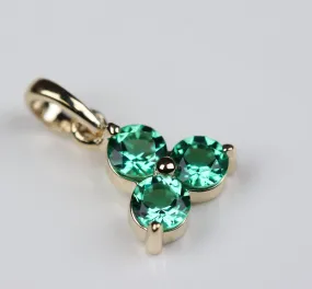 . Emerald Three Stone Charm