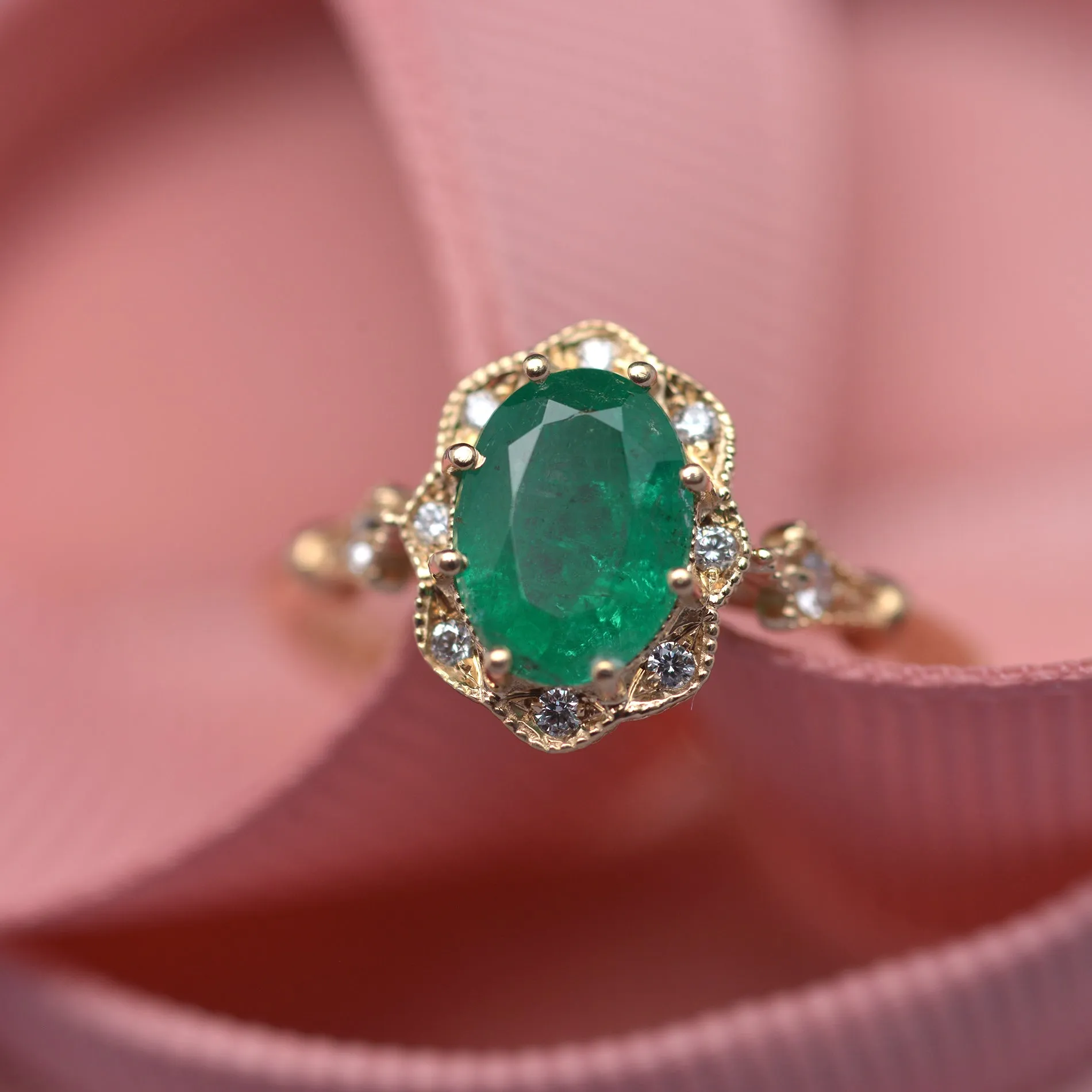 Natural Green Zambian Emerald in a Daisy Oval engagement ring