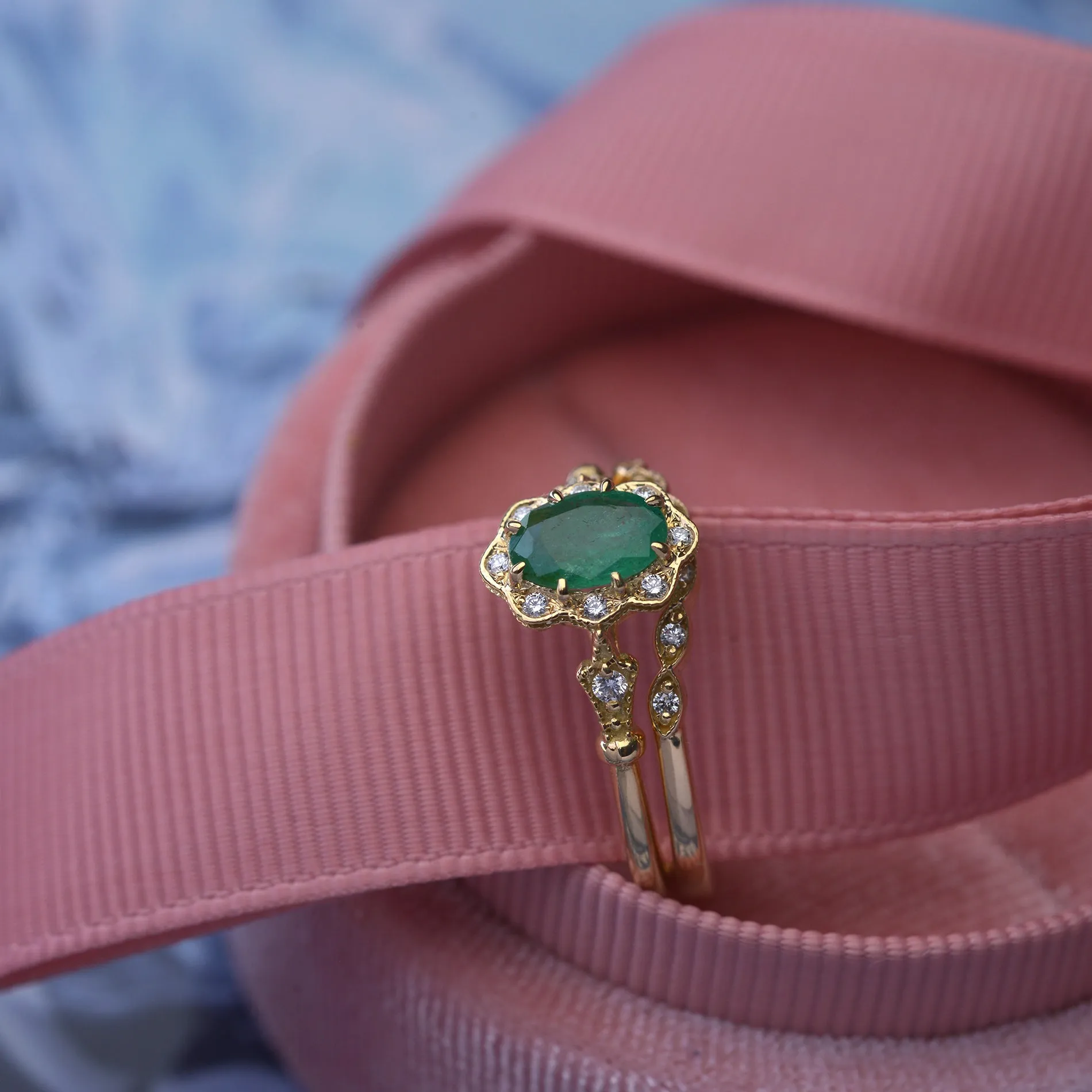 Natural Green Zambian Emerald in a Daisy Oval engagement ring